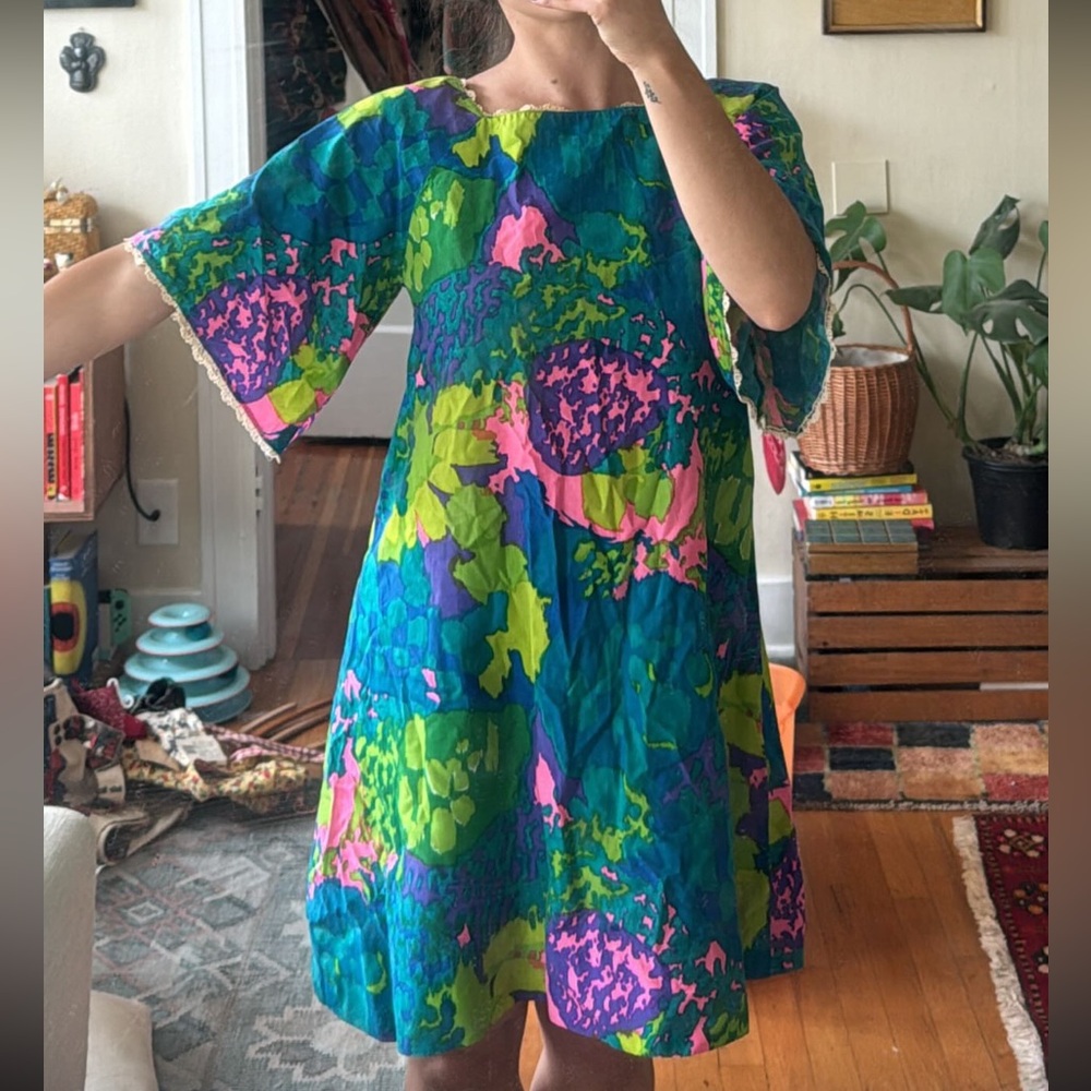 Vintage 70s psychedelic floral dress with a butterfly sleeve